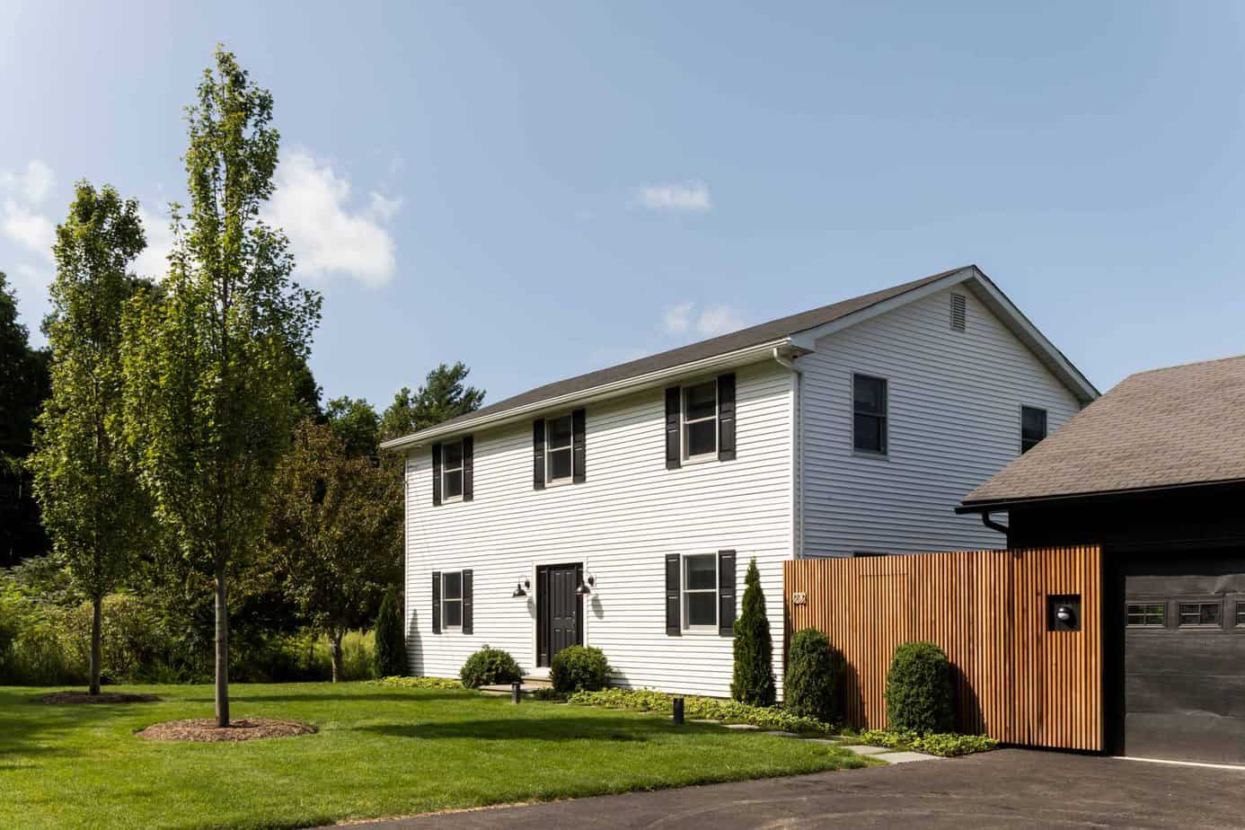 Mountainside Extended Care Womens House - White house with gate