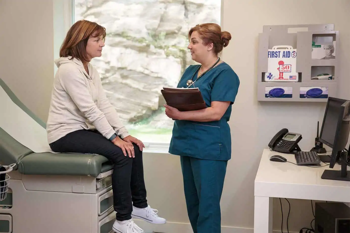 Nurse Discussing Medical & Psychiatric Services in Addiction Treatment