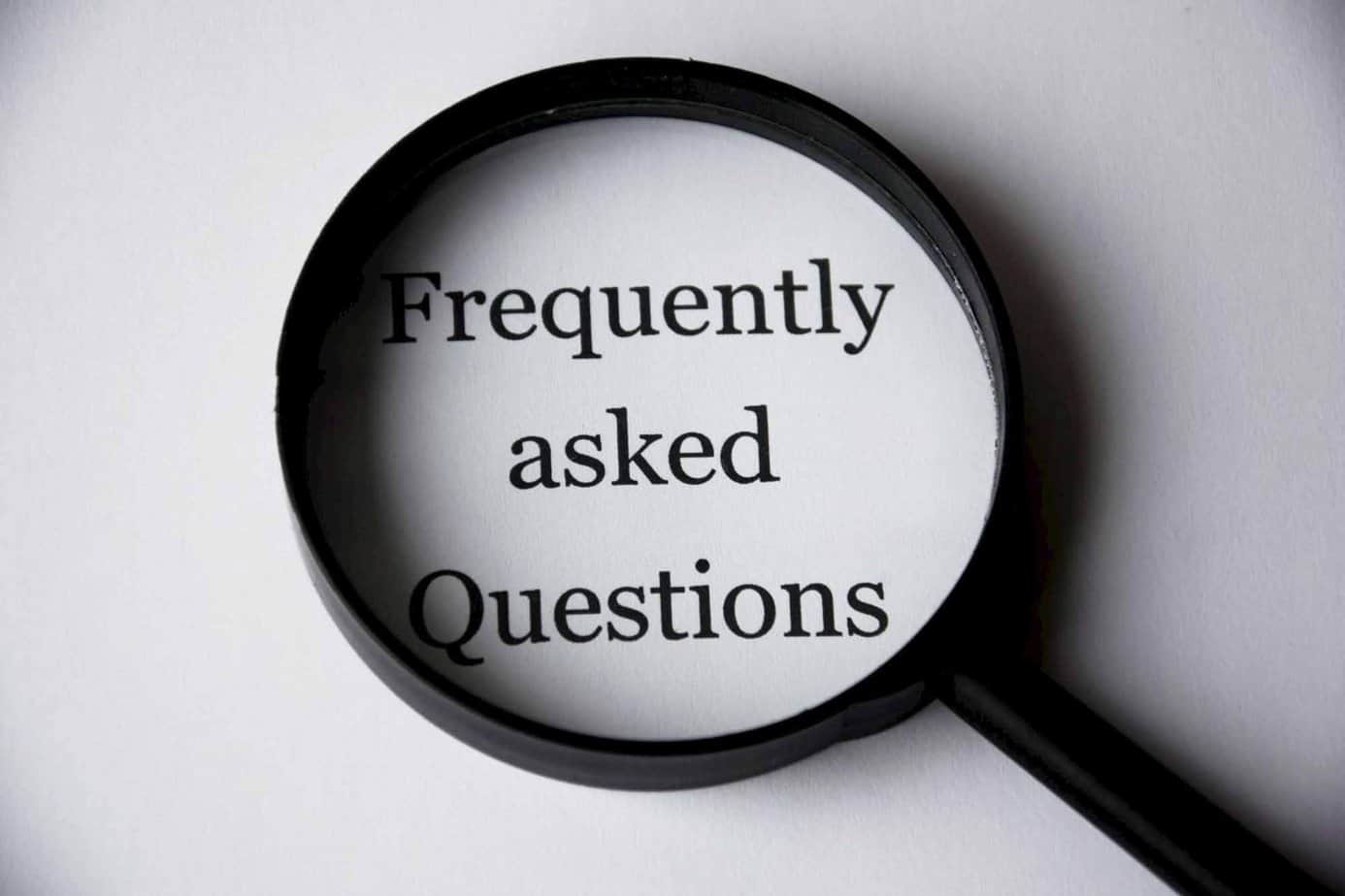 magnifying glass looking up frequently asked questions