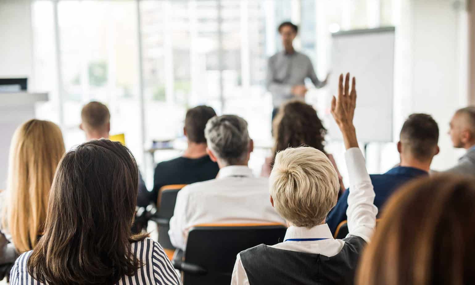 A group of addiction treatment professionals in a seminar.