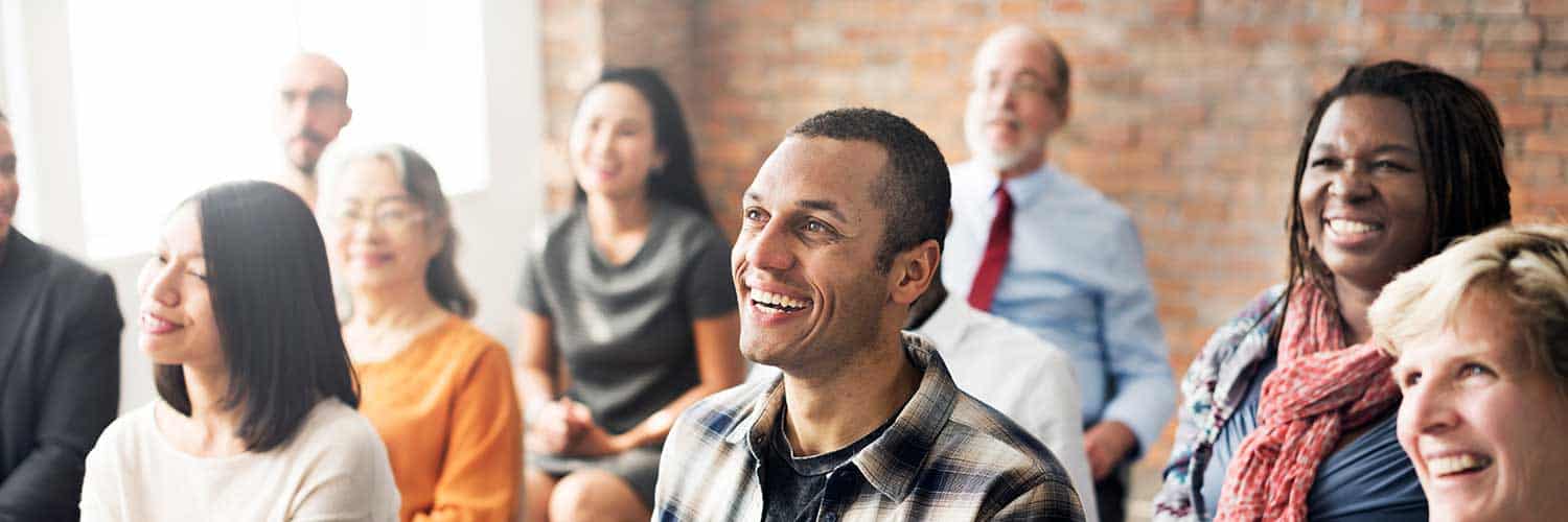 happy group of people in a meeting