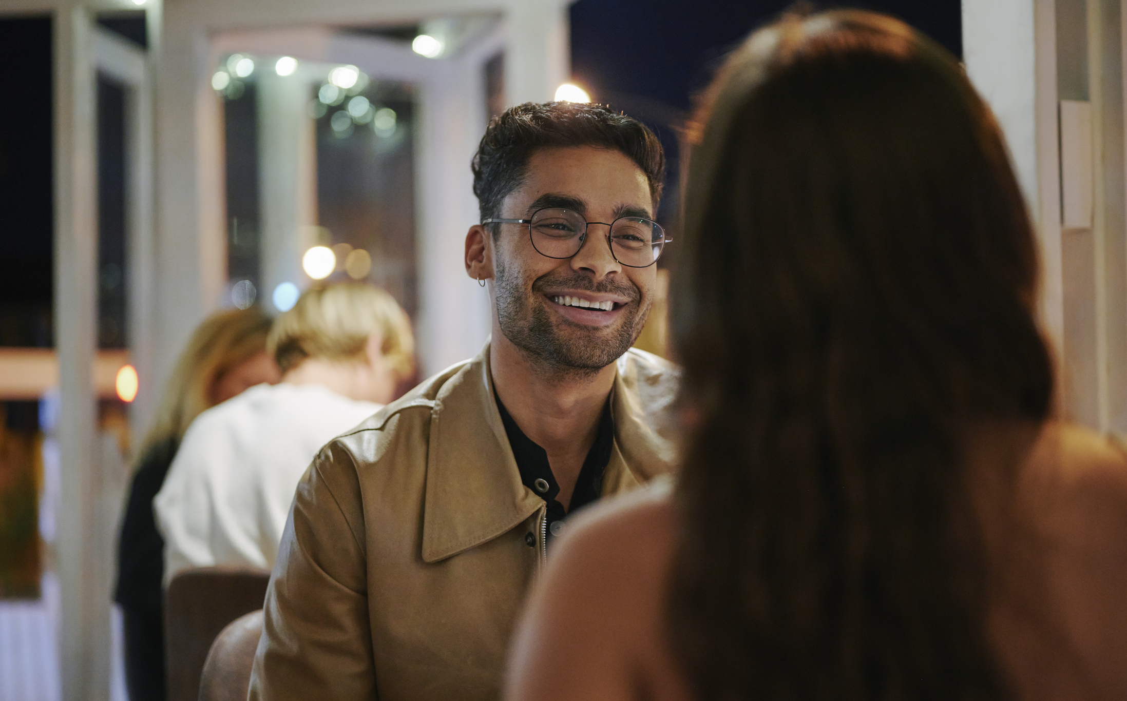 sober man out dinner with his partner who is drinking